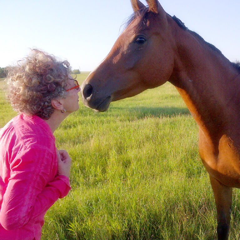 Blow softly into each other's nostrils.