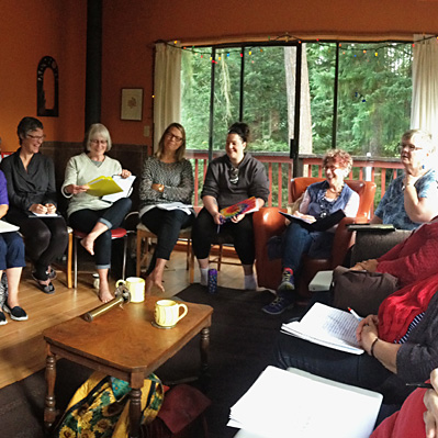 A living room session circle of poets.